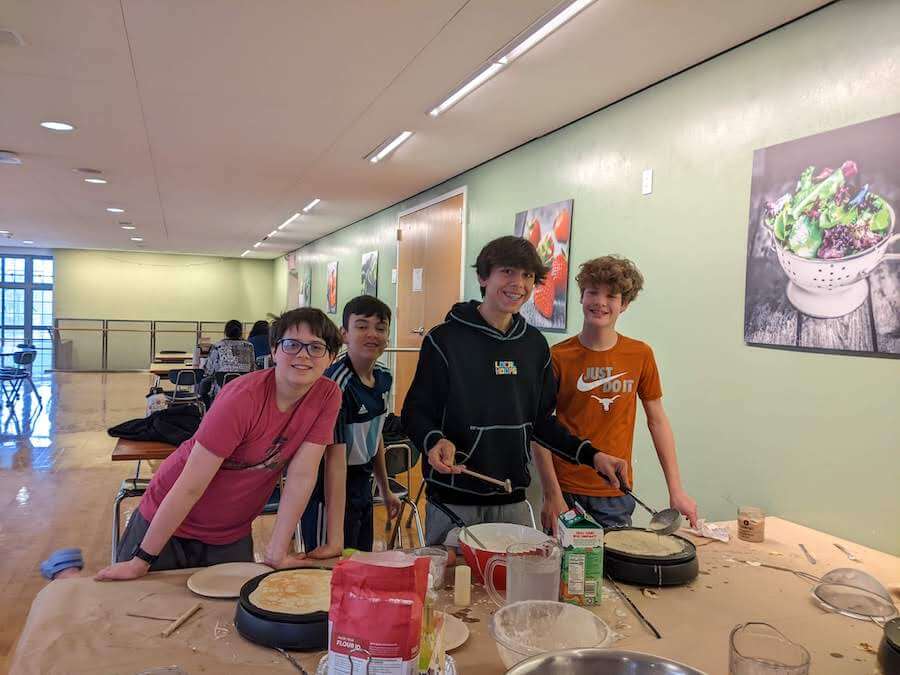 Ethical Culture Fieldston School Middle School students make crepes for class