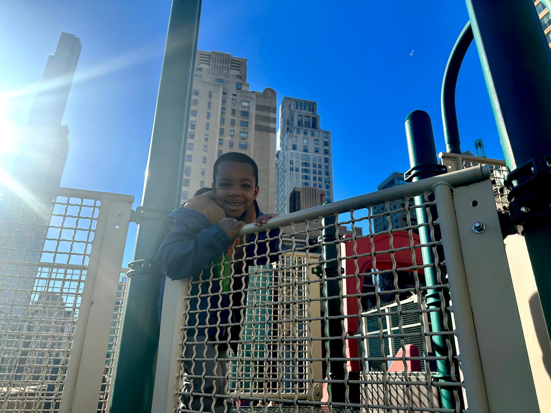 Ethical Culture Fieldston School student poses for a photo on the Ethical Culture rooftop