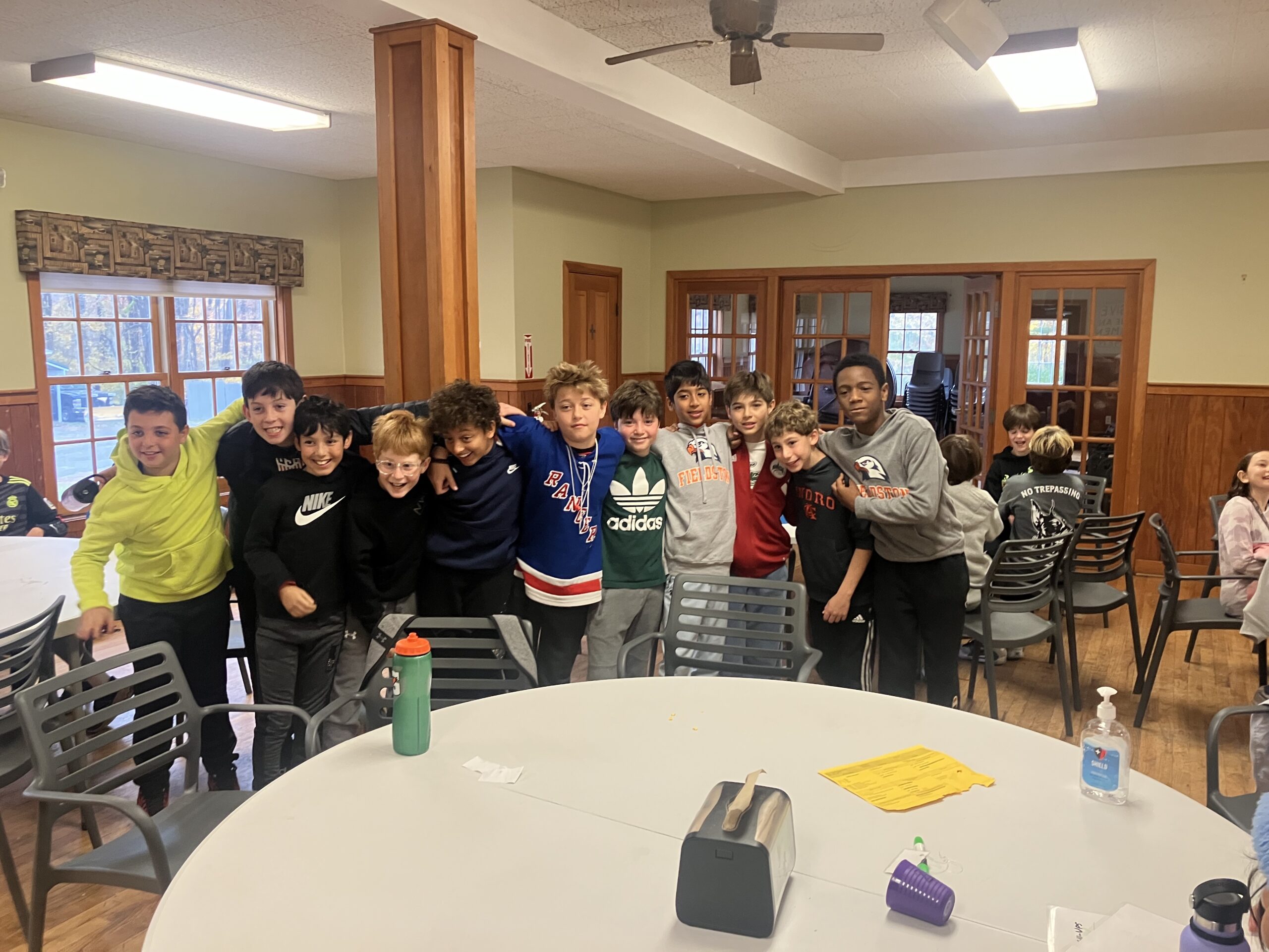 Students pose together inside the dining hall at Nature's Classroom.