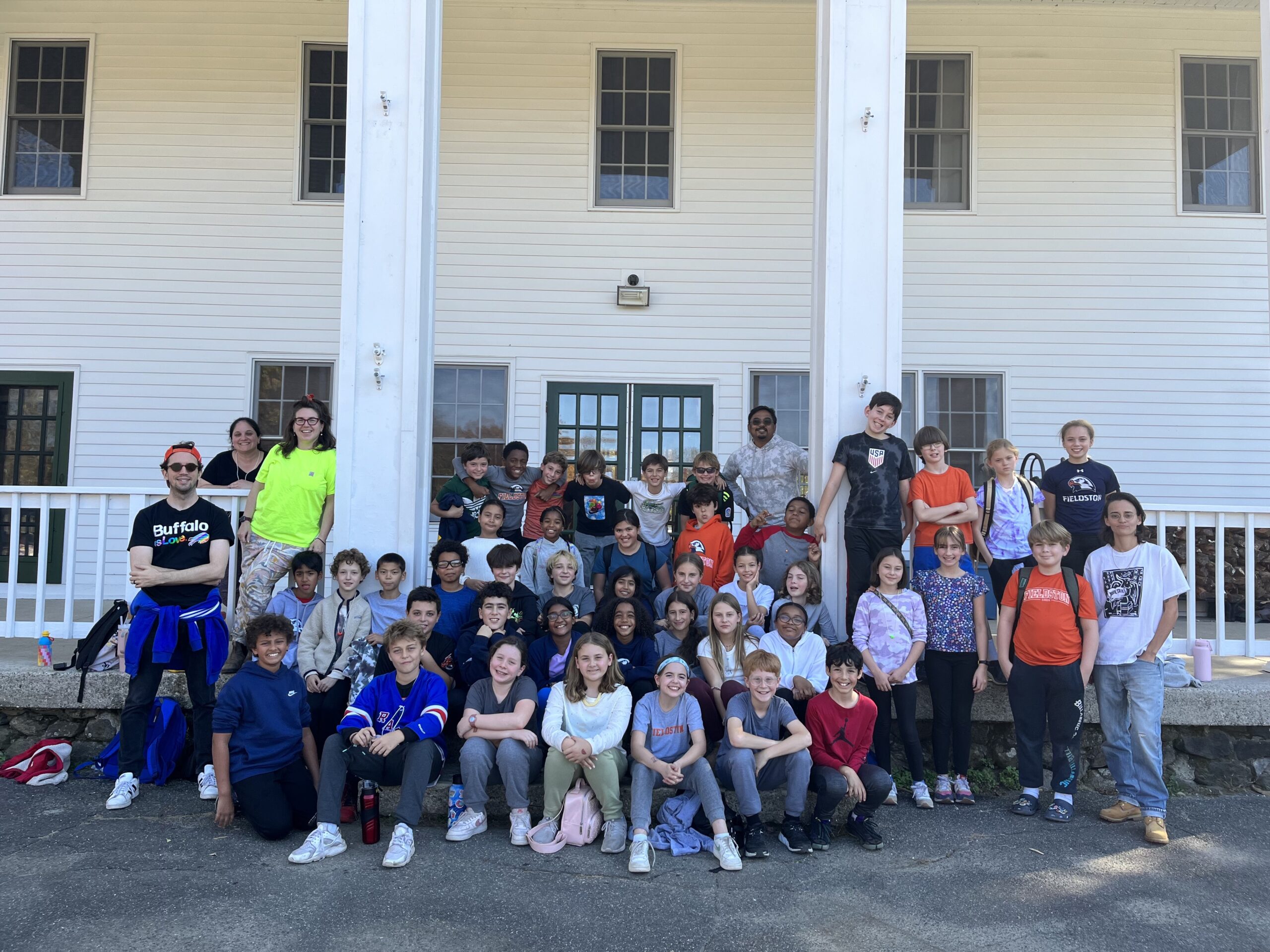 Fieldston Lower students and chaperone pose in big group at Nature's Classroom.