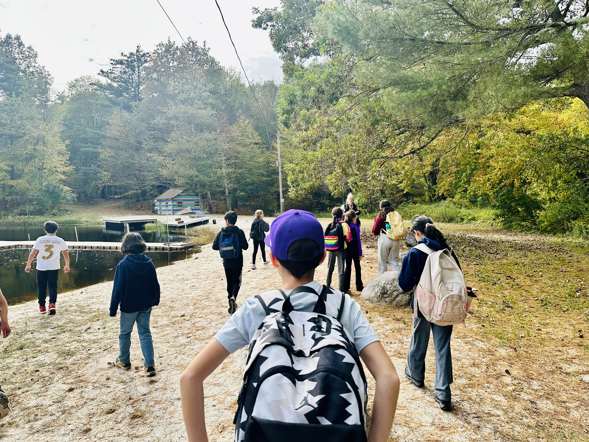 Ethical Culture students hike to a lake together at Nature's Classroom.