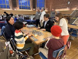 Fieldston Lower students and families enjoy games together in Fieldston Upper dining hall at Fieldston Lower Game Night.