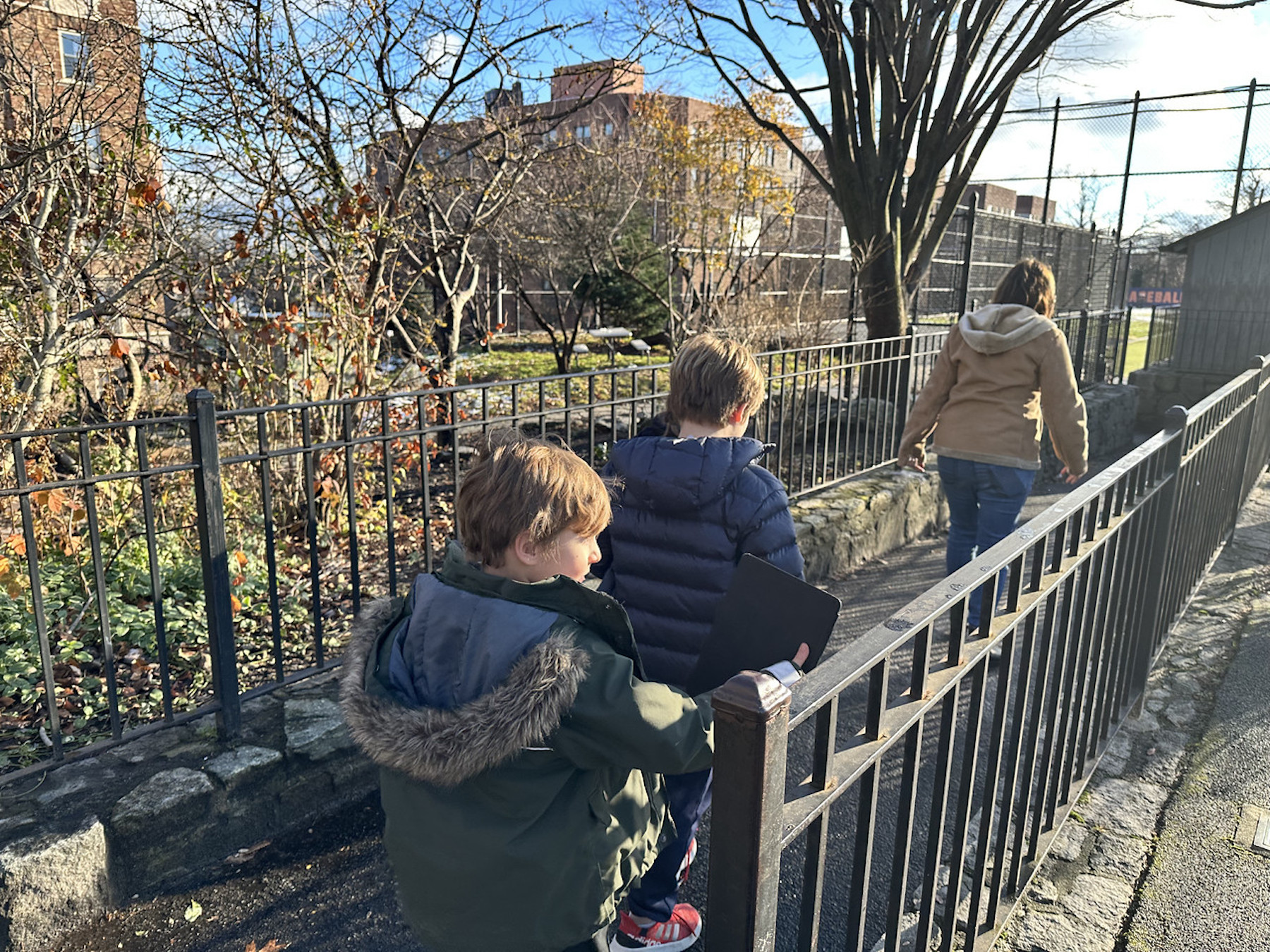 Students scout locations outside to take pictures.