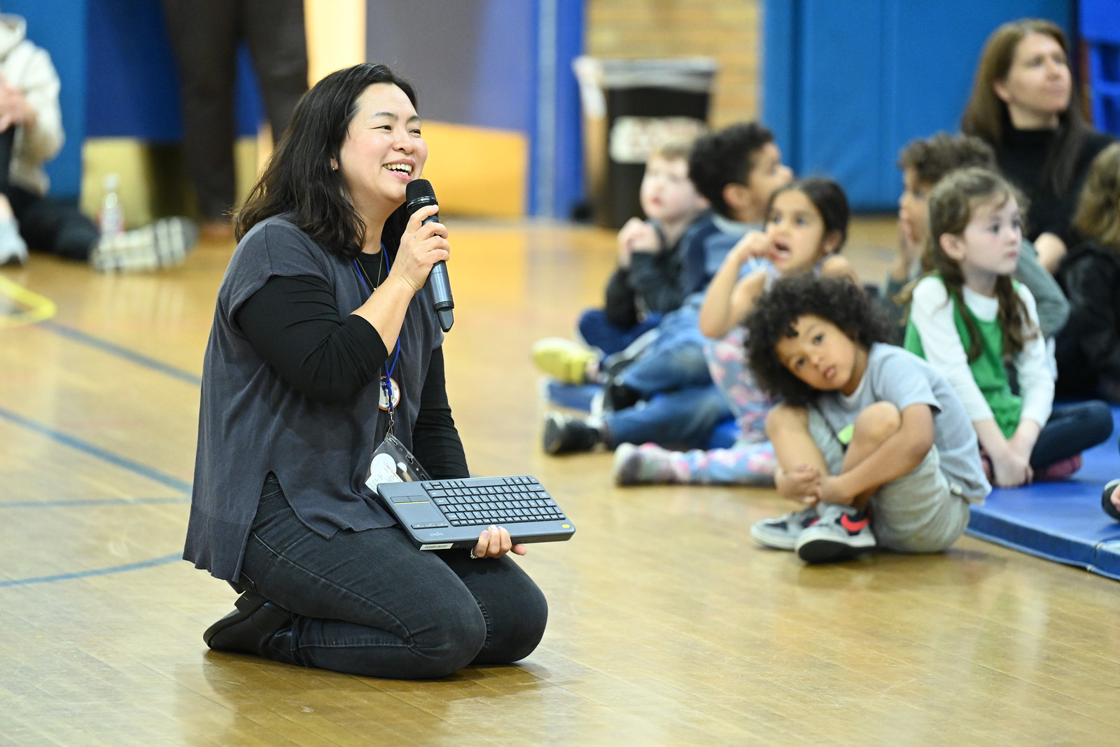 Fieldston Lower Ethics Teacher Min Young Song opens assembly. 