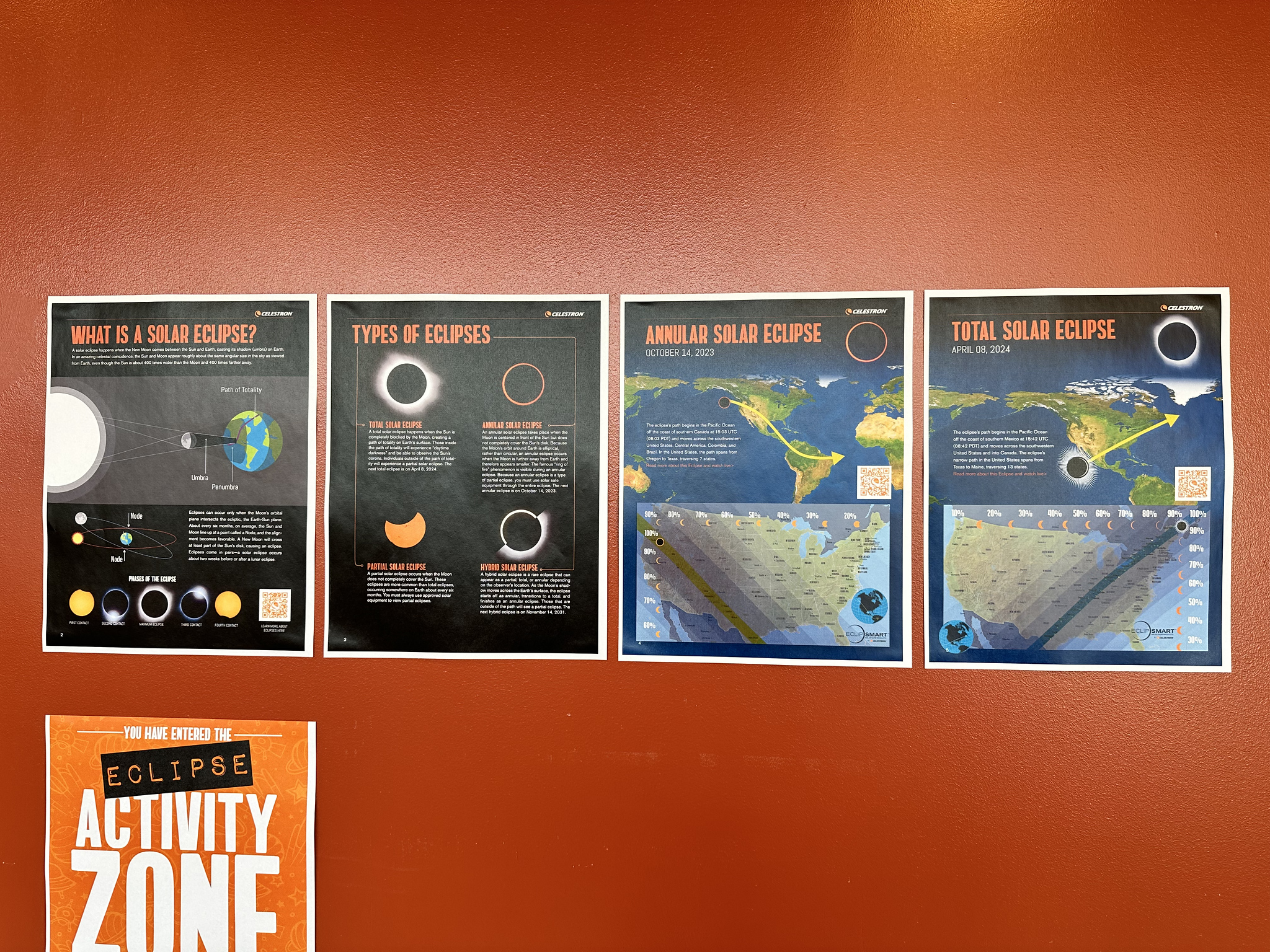 Eclipse themed posters on the wall outside of Michael Wilkinson's Fieldston Lower classroom.