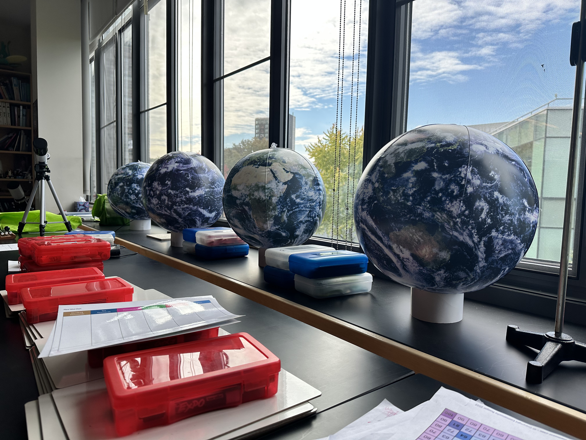 Globes sit on windowsill in Michael Wilkinson's 4th Grade classroom.