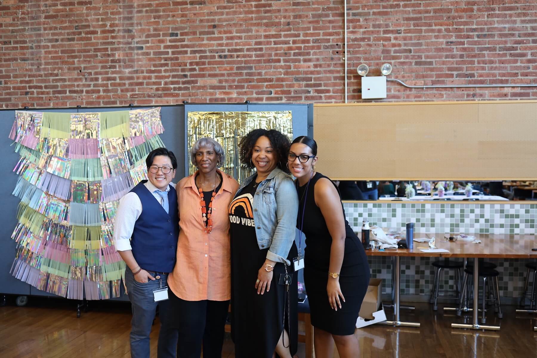 Members of the DEI Department and faculty advisor Janet Pugh pose for photo at Bridge to Bridge celebration.