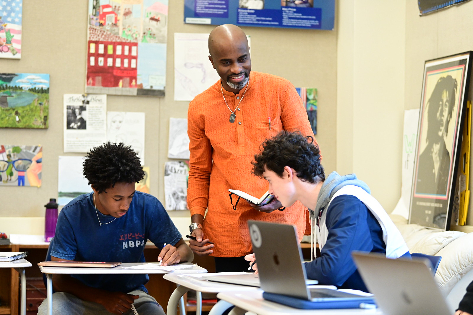 English Department Chair Alwin Jones speaks to students in a classroom. 