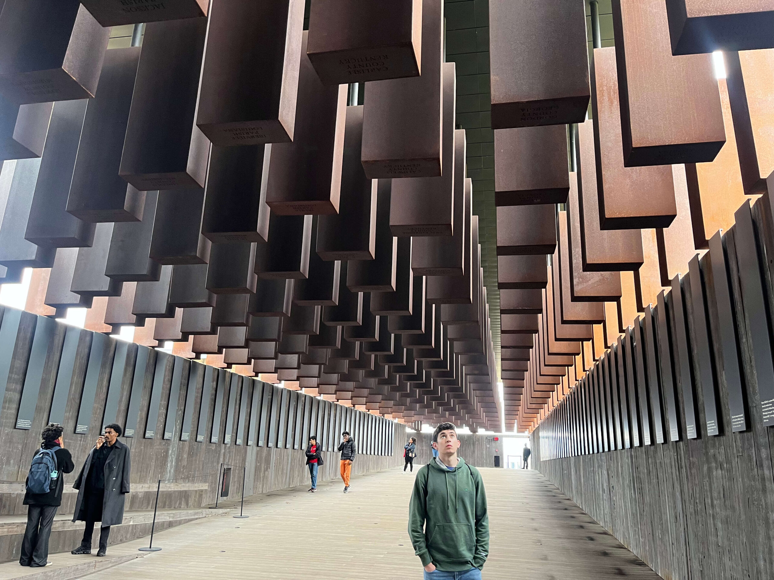 A Fieldston Upper student observes a landmark site on a trip to Alabama.