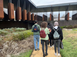 Some Fieldston Upper students walk through a site on their Alabama tour.