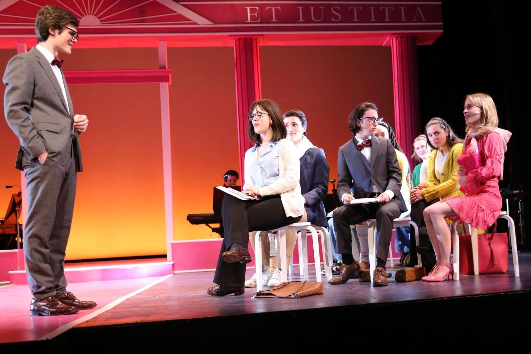 A group of Ethical Culture Fieldston Upper School students perform onstage in Legally Blonde.