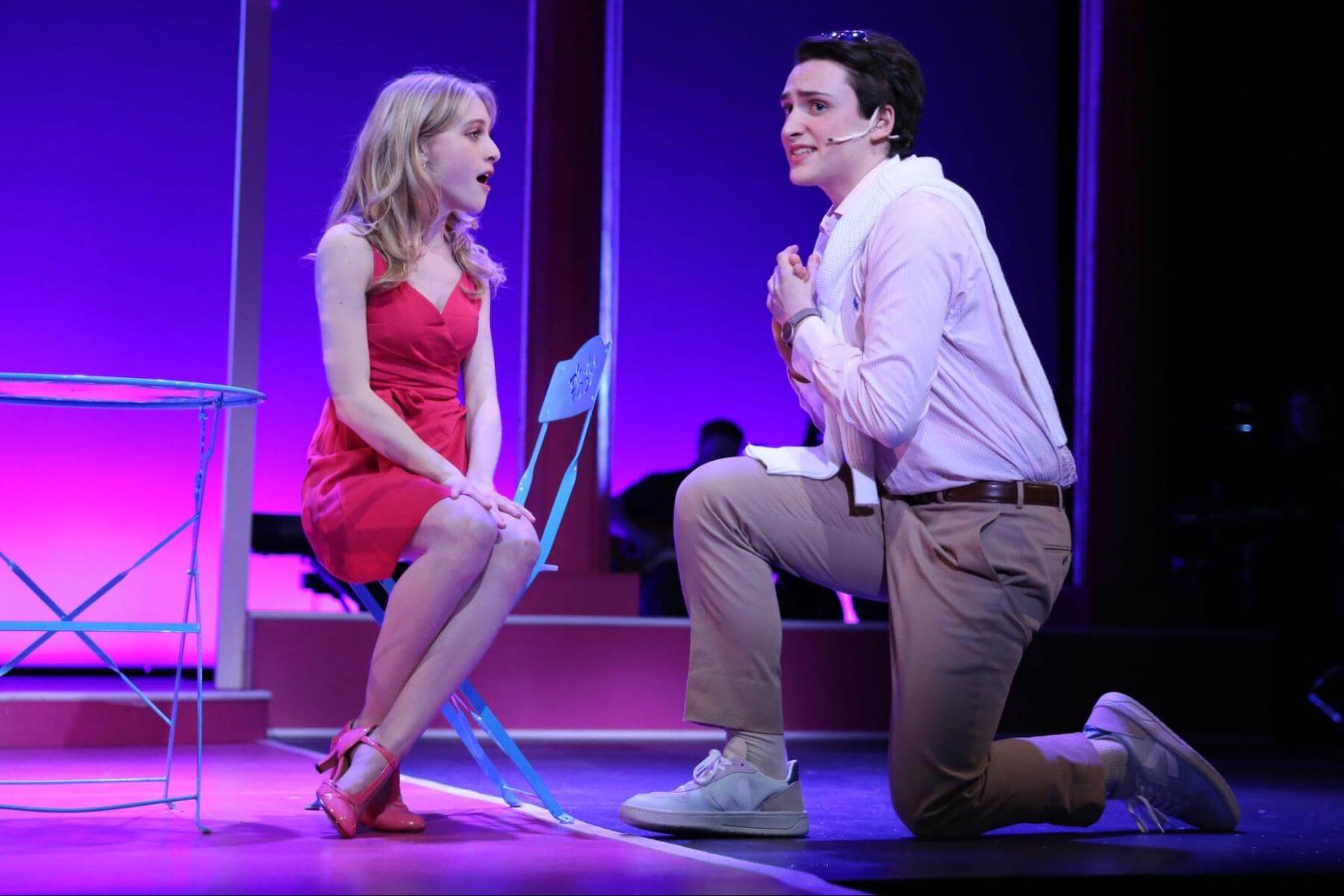 Two Ethical Culture Fieldston Upper School students perform onstage as Elle and Warner in Legally Blonde.