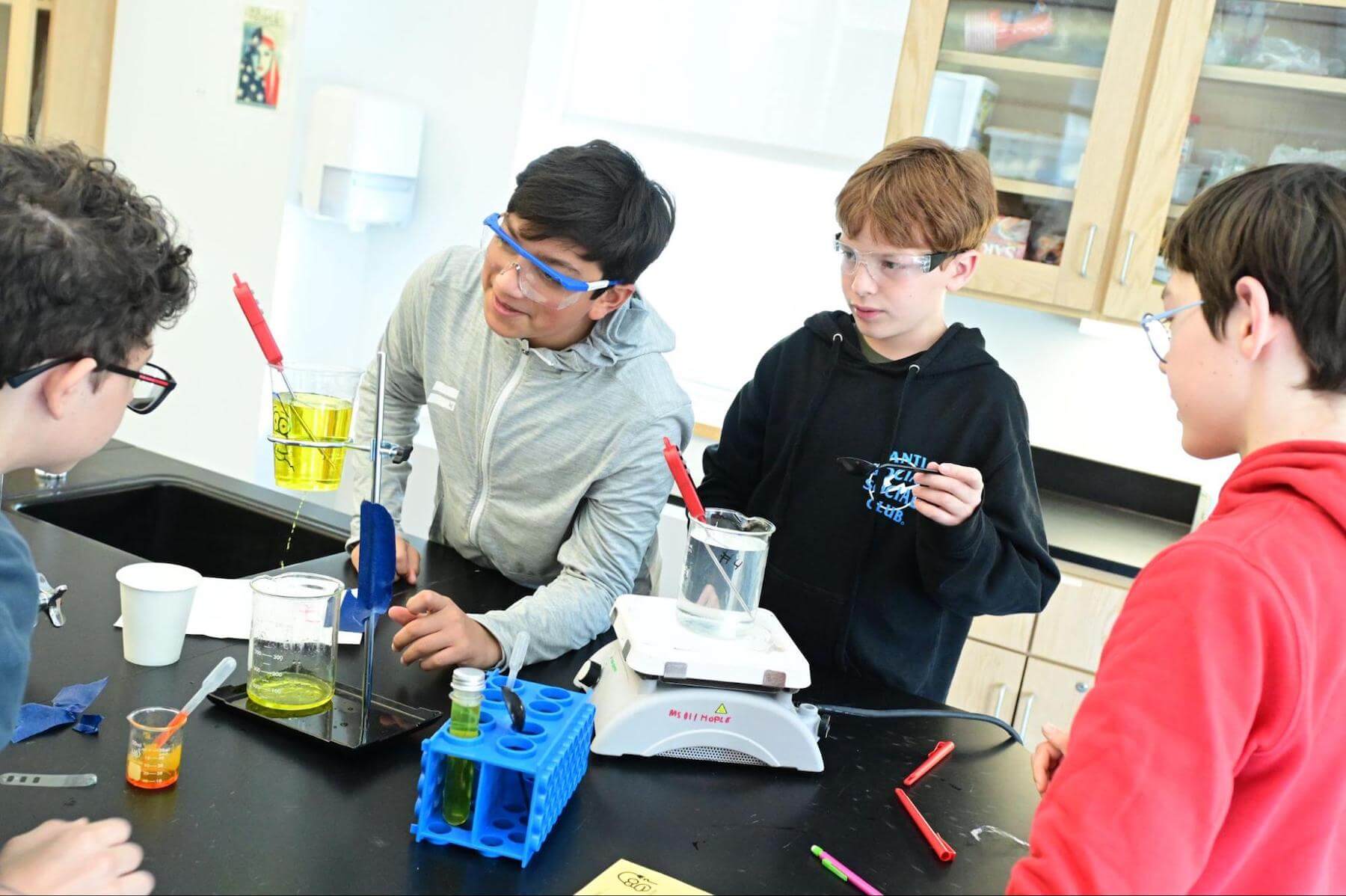 7th Grade students at Ethical Culture Fieldston School perform a science experiment.