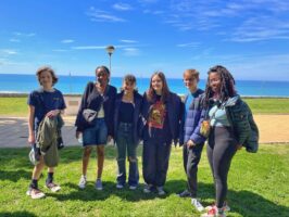 A group of Ethical Culture Fieldston Middle School students pose in Spain