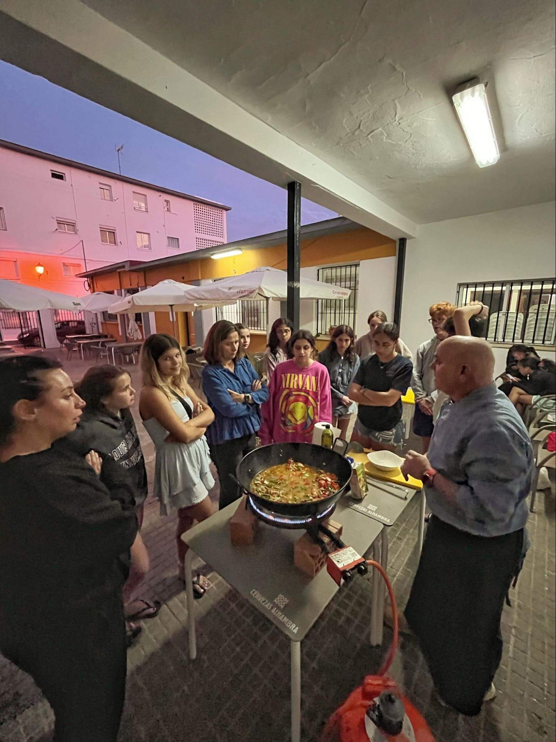 A group of Ethical Culture Fieldston Middle School students learn how to cook paella in Spain