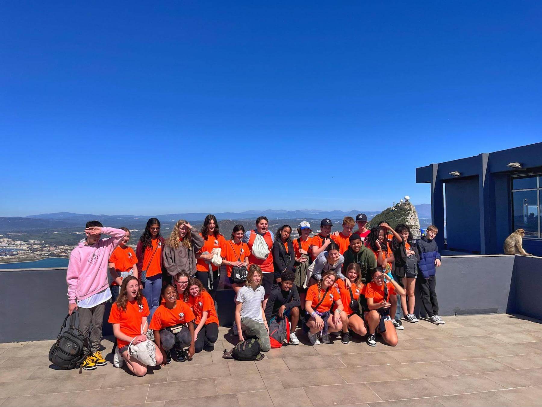 A group of Ethical Culture Fieldston Middle School students pose in Spain