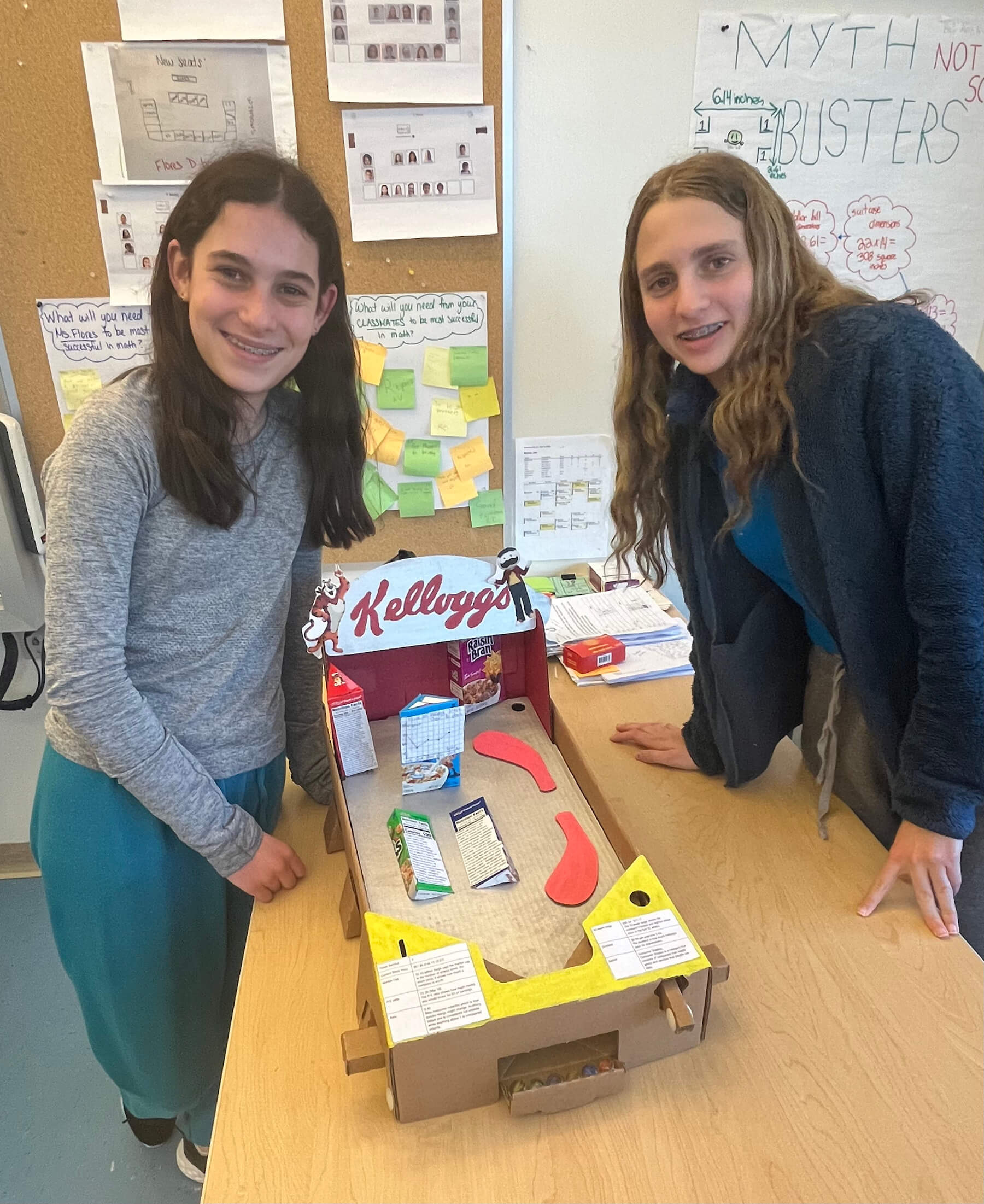 Two Ethical Culture Fieldston 6th Grade students present their project to the class.