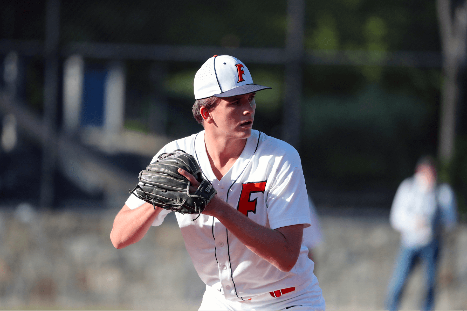 An Ethical Culture Fieldston baseball player participates at Spring Fling.