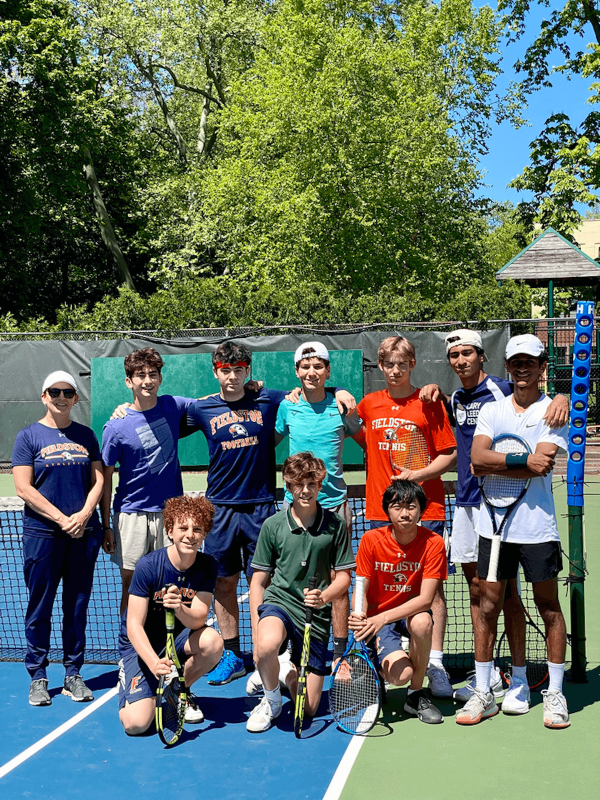 Ethical Culture Fieldston tennis athletes pose at Spring Fling.