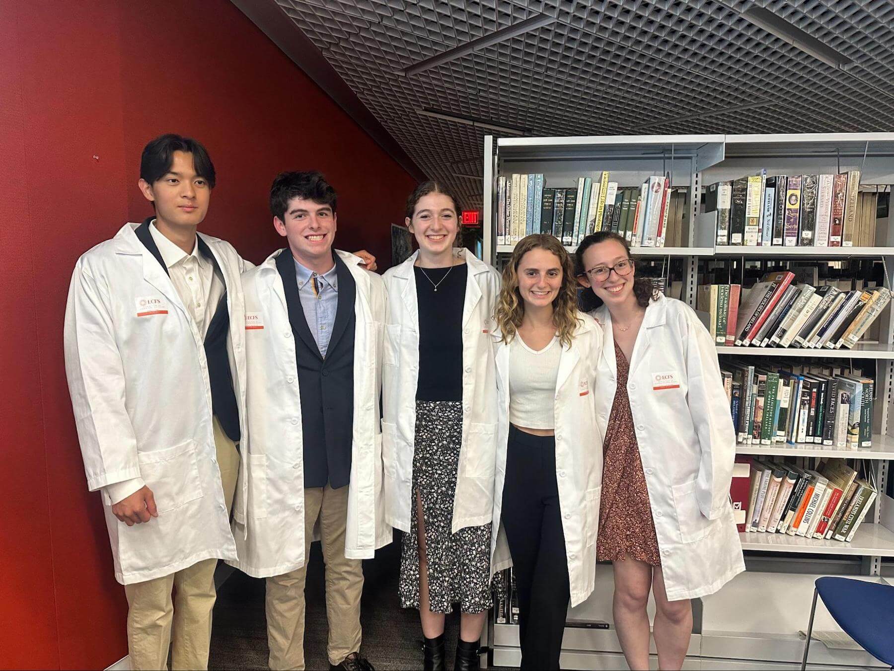 Ethical Culture Fieldston School students speak at science research event.
