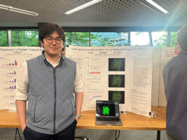 An Ethical Culture Fieldston School student speaks at science research event.