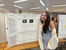 An Ethical Culture Fieldston School student speaks at science research event.