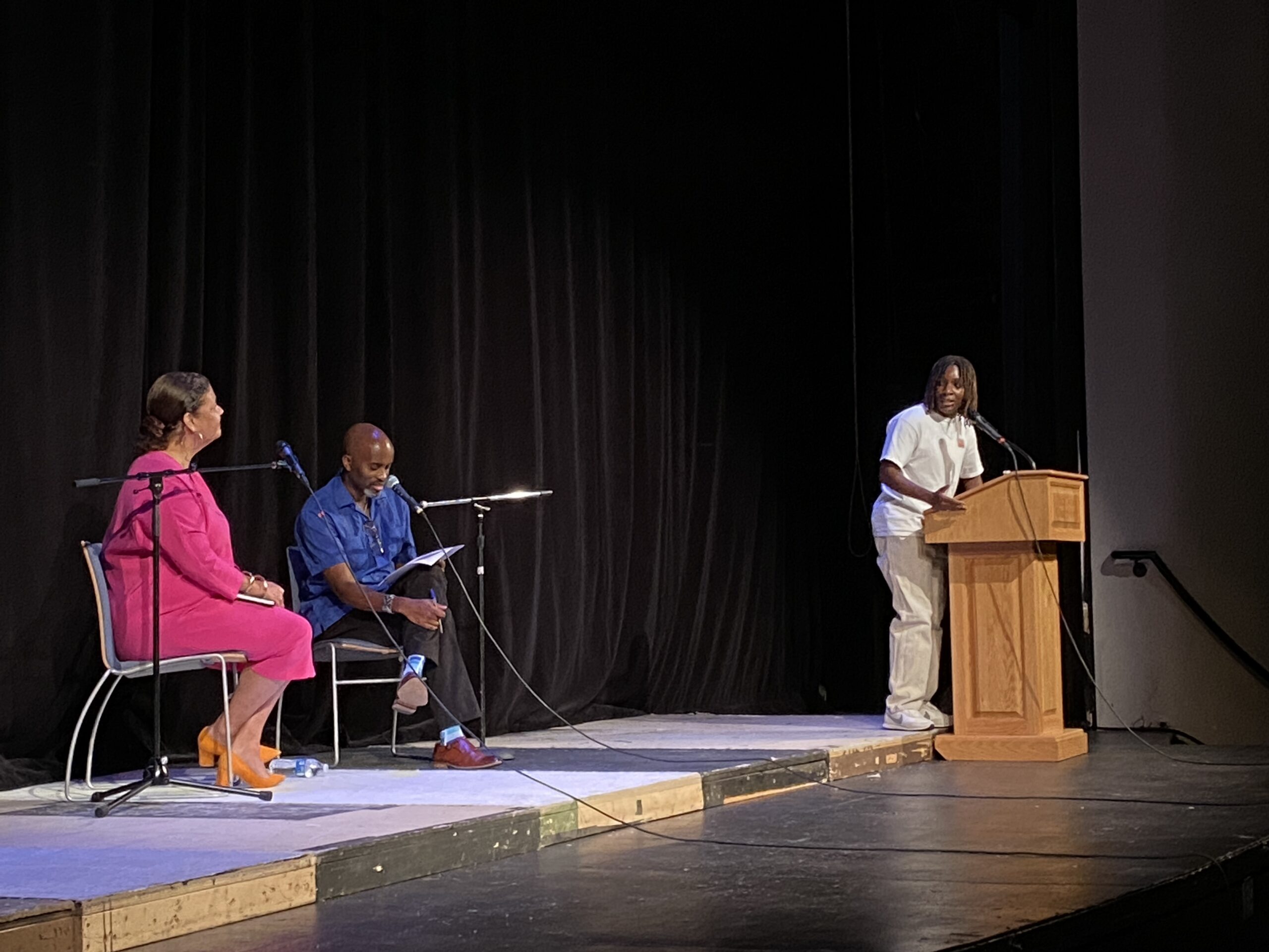 Fieldston Upper student, Dr. Alwin Jones, and Dr. Elizabeth Alexander on the auditorium stage during the Community Curriculum Assembly