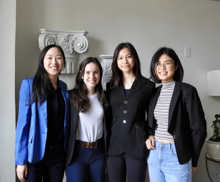 Four members of the Females in Finance Club pose for photograph