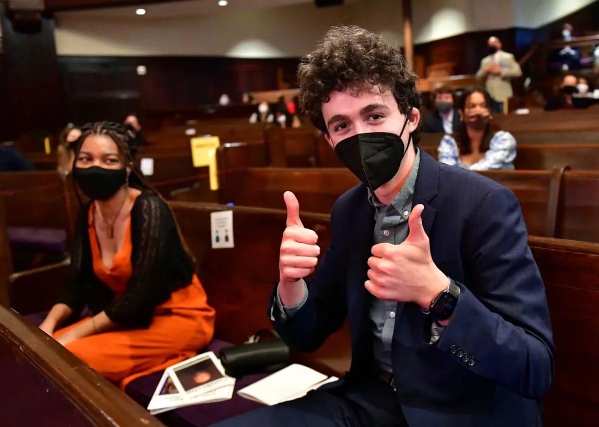 Student gives thumbs up at Founder's Day