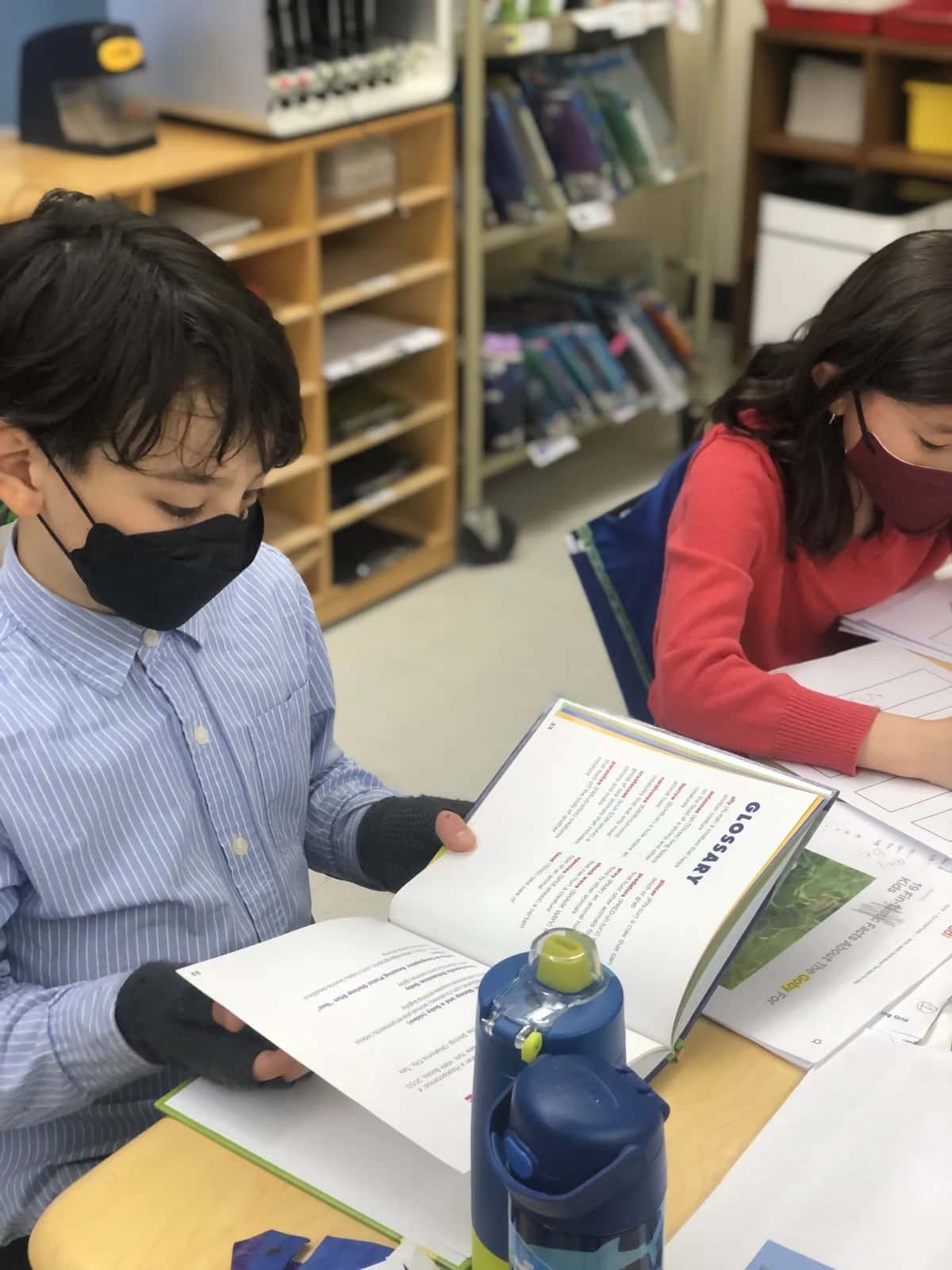 Student uses book to research sea creatures