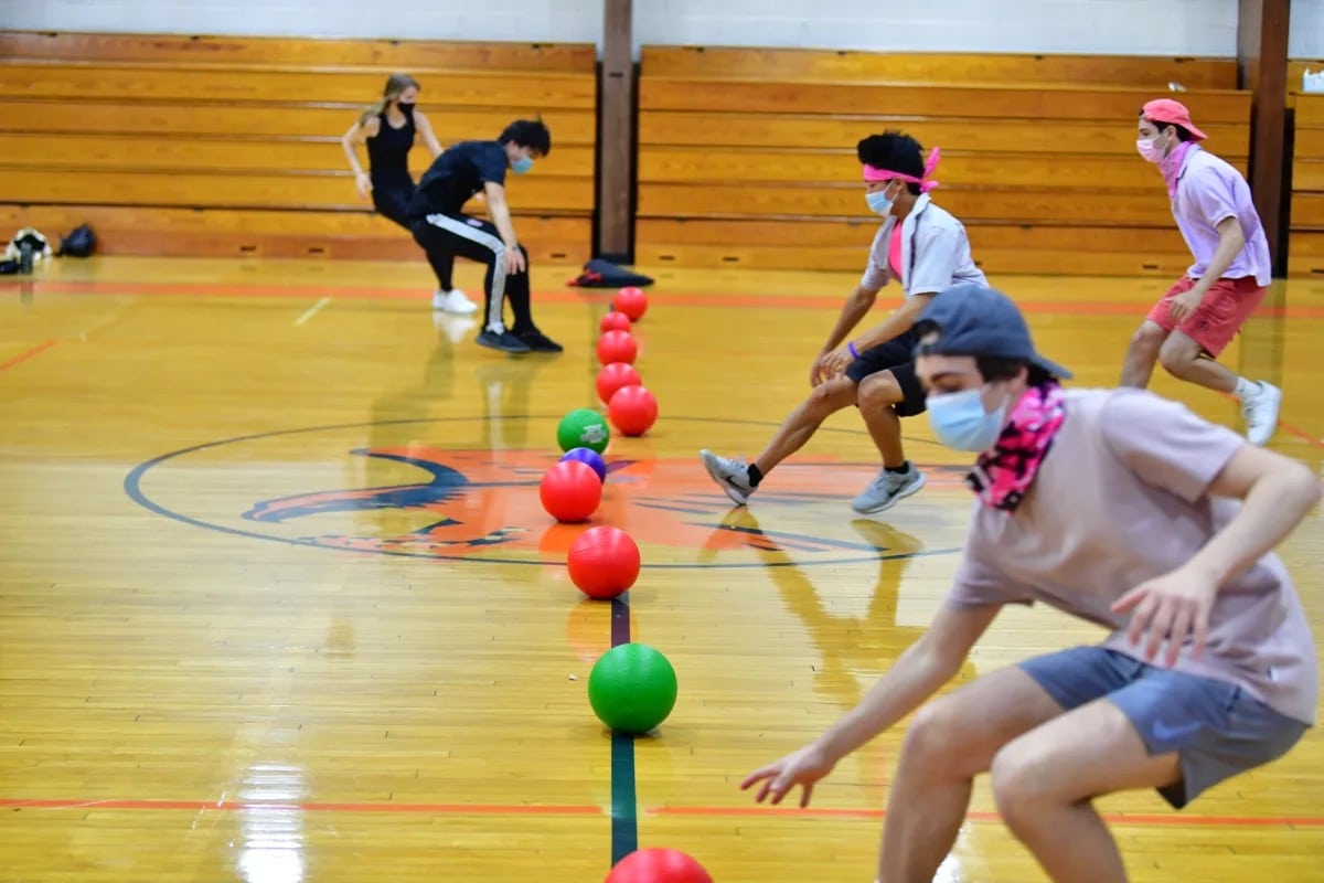 Students play dodgeball in Varsity Gym