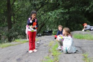 Students speak outdoors during lunch