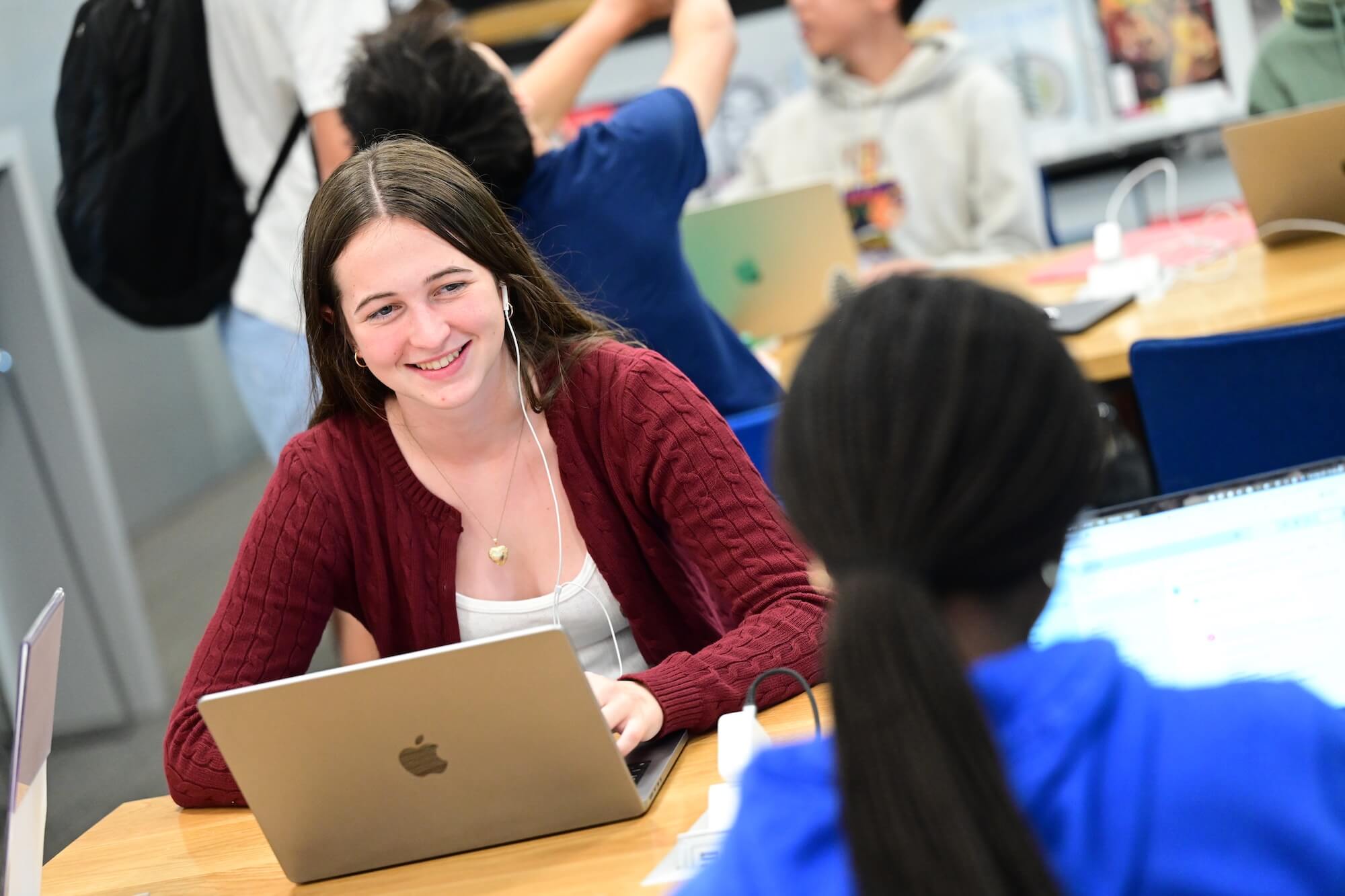 A student at Fieldston Upper studies in the Tate Library 
