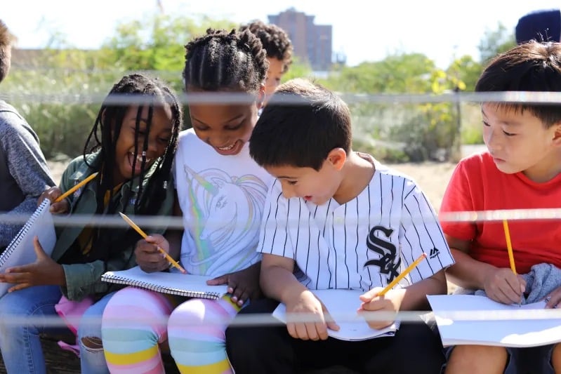 Ethical Culture Fieldston School 2nd Graders sketching in notebooks together