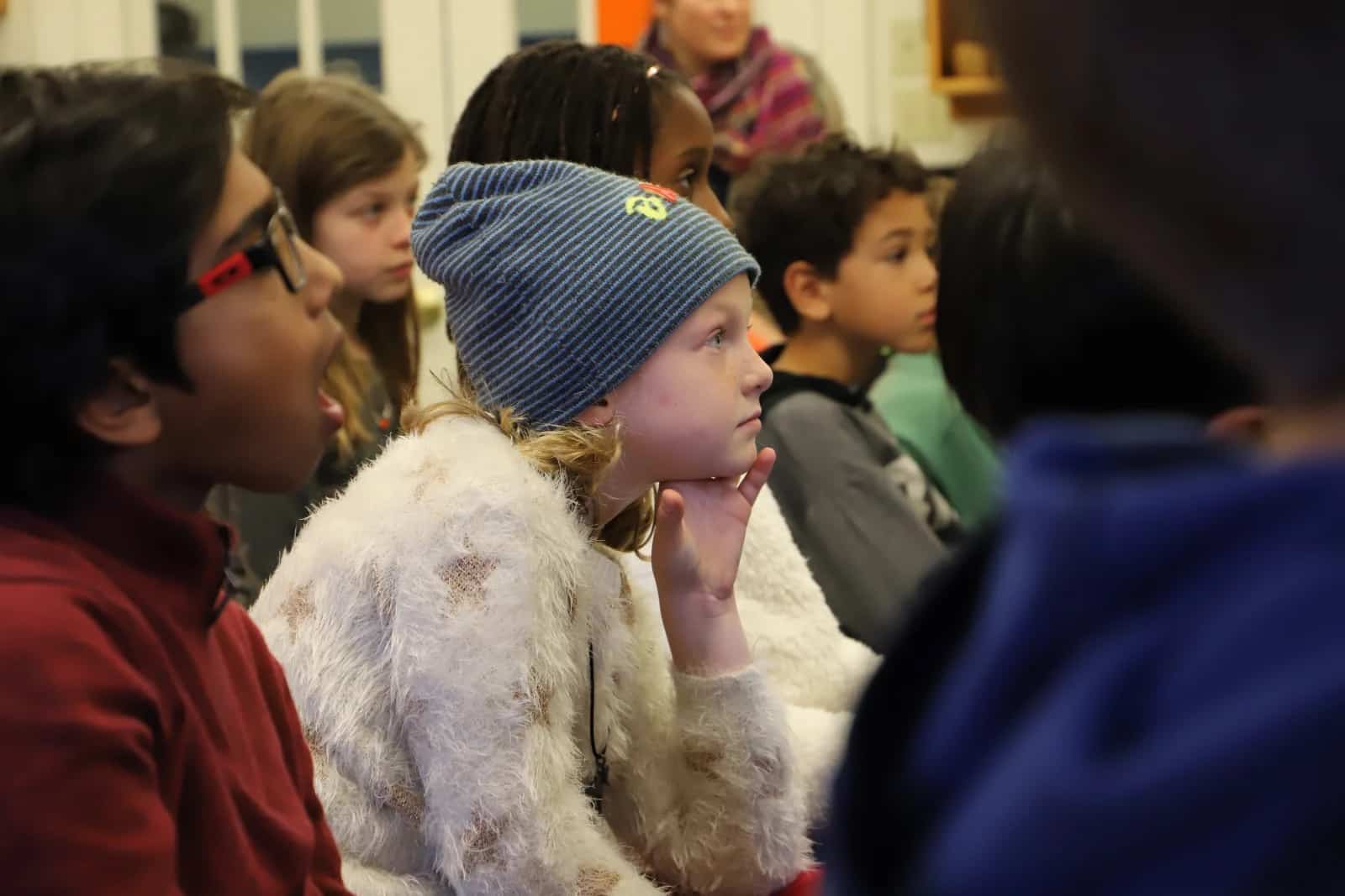 Young student watches Craft intently