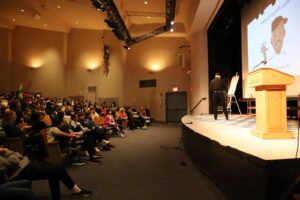 Craft gives presentation to Middle School students in auditorium