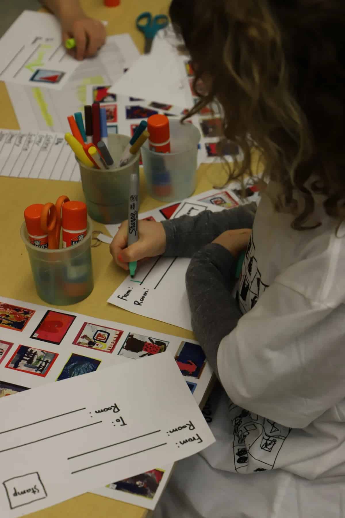 Student addresses envelope